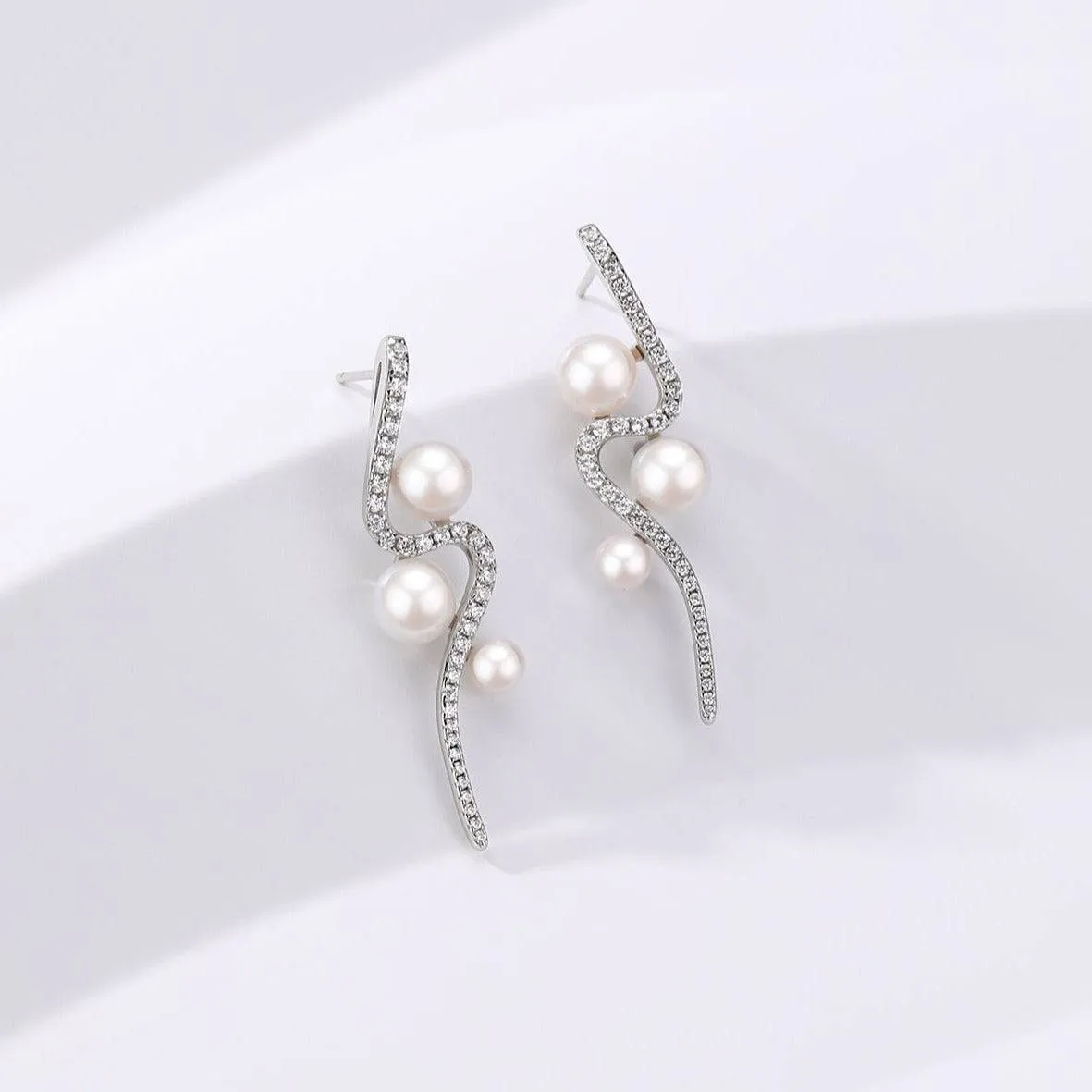 Elegant Curve 925 Silver & Freshwater Pearl Studs