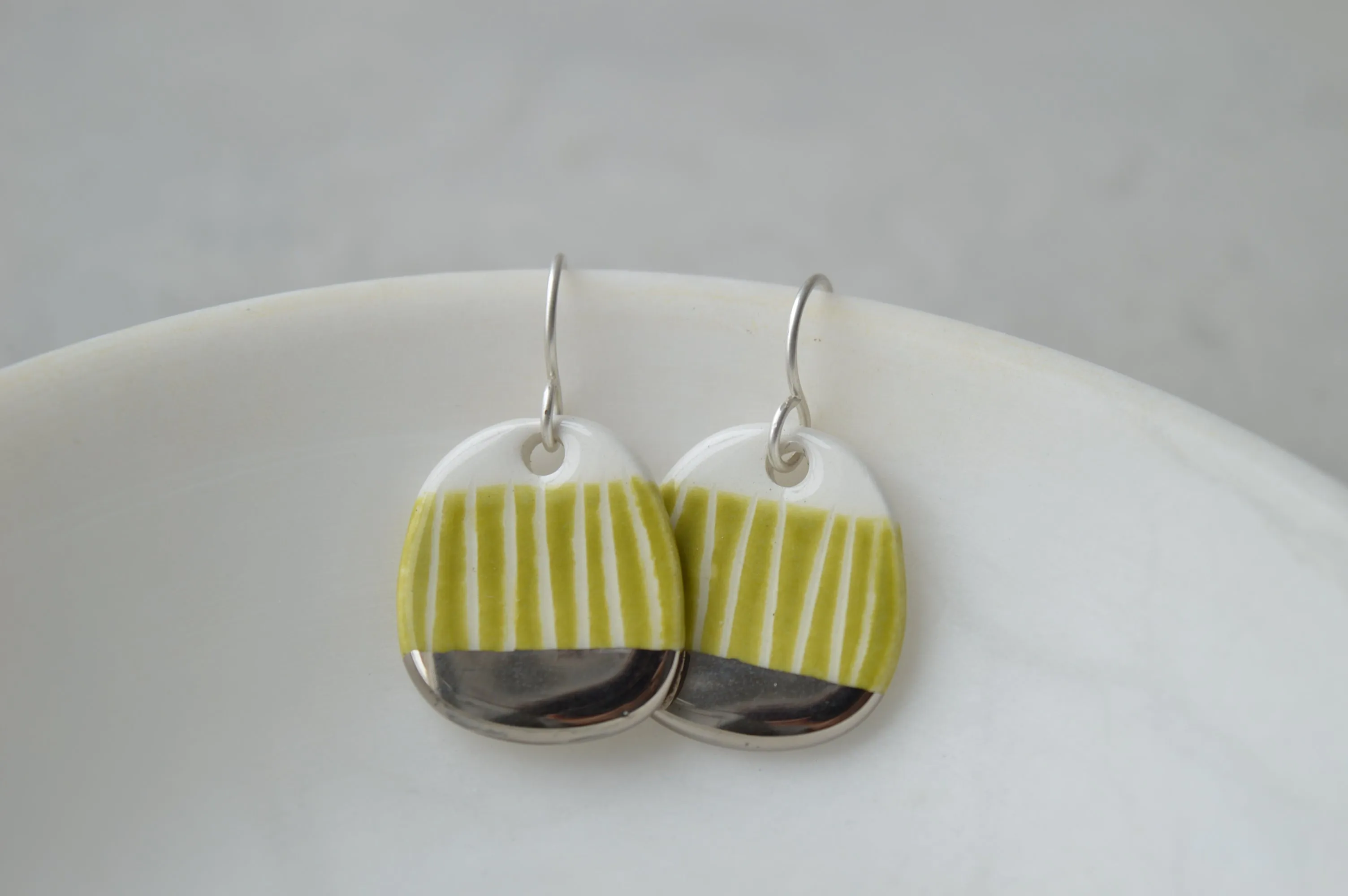 Small green sgraffito dangle earrings